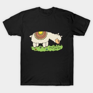 Alpaca eats grass on a meadow. T-Shirt